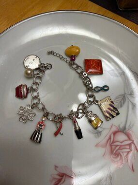 Avon Charm Bracelet - 12 charms